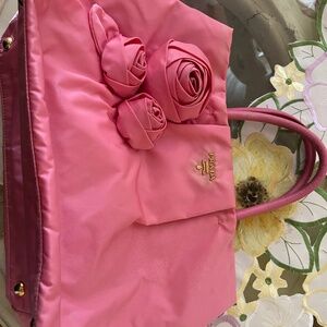 Prada pink nylon handbag with roses